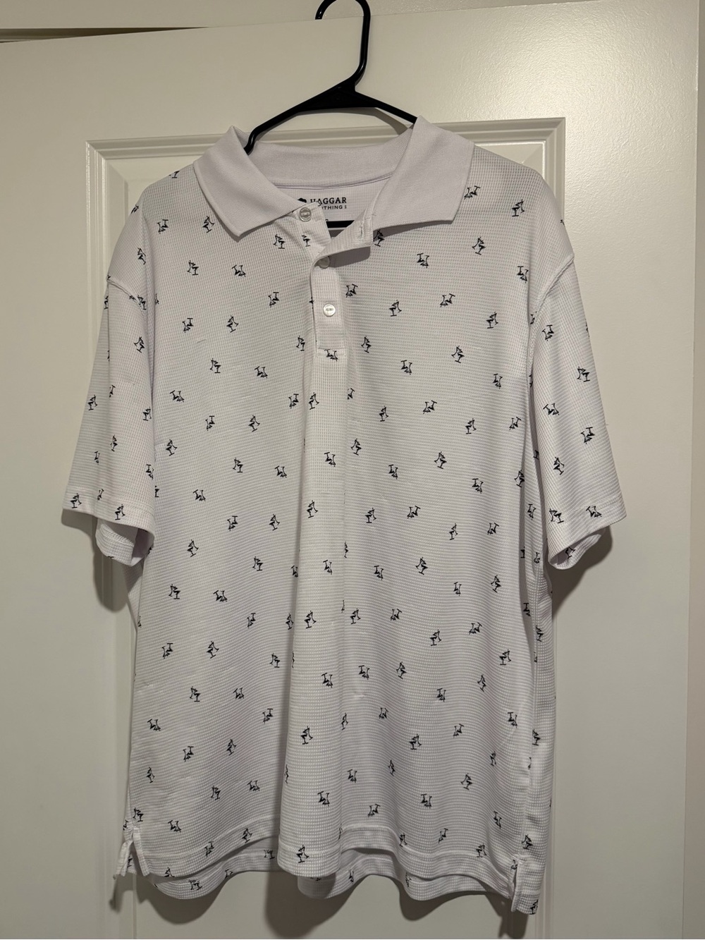 Villager White Polo with Small Black Golf Player Motif